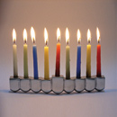 A Hanukka Menorah made of aluminum casting.
Inspired by the Sevivon - Hanukka's traditional spinning top.
